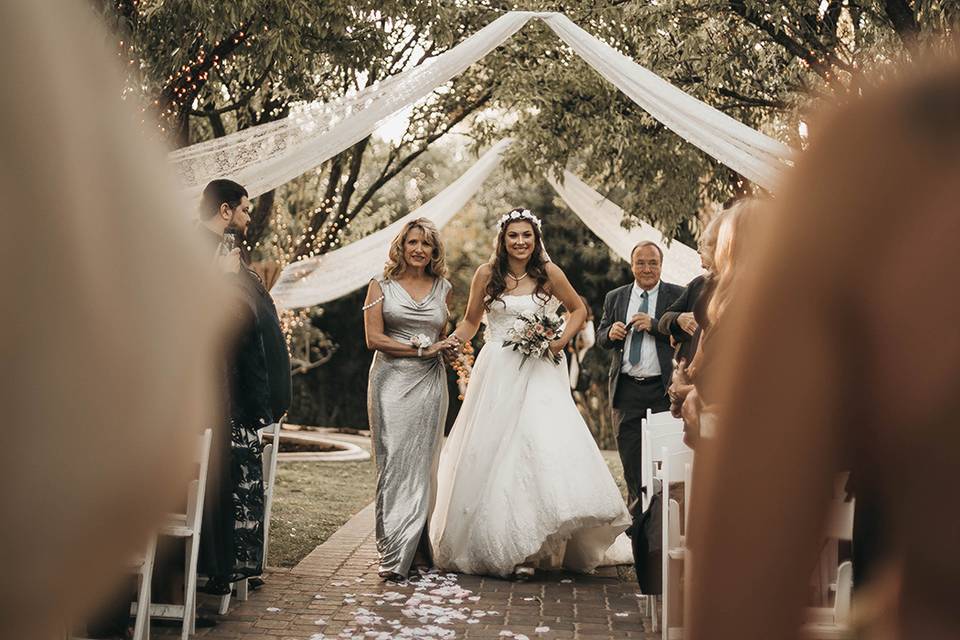 A bride walking down the aisle