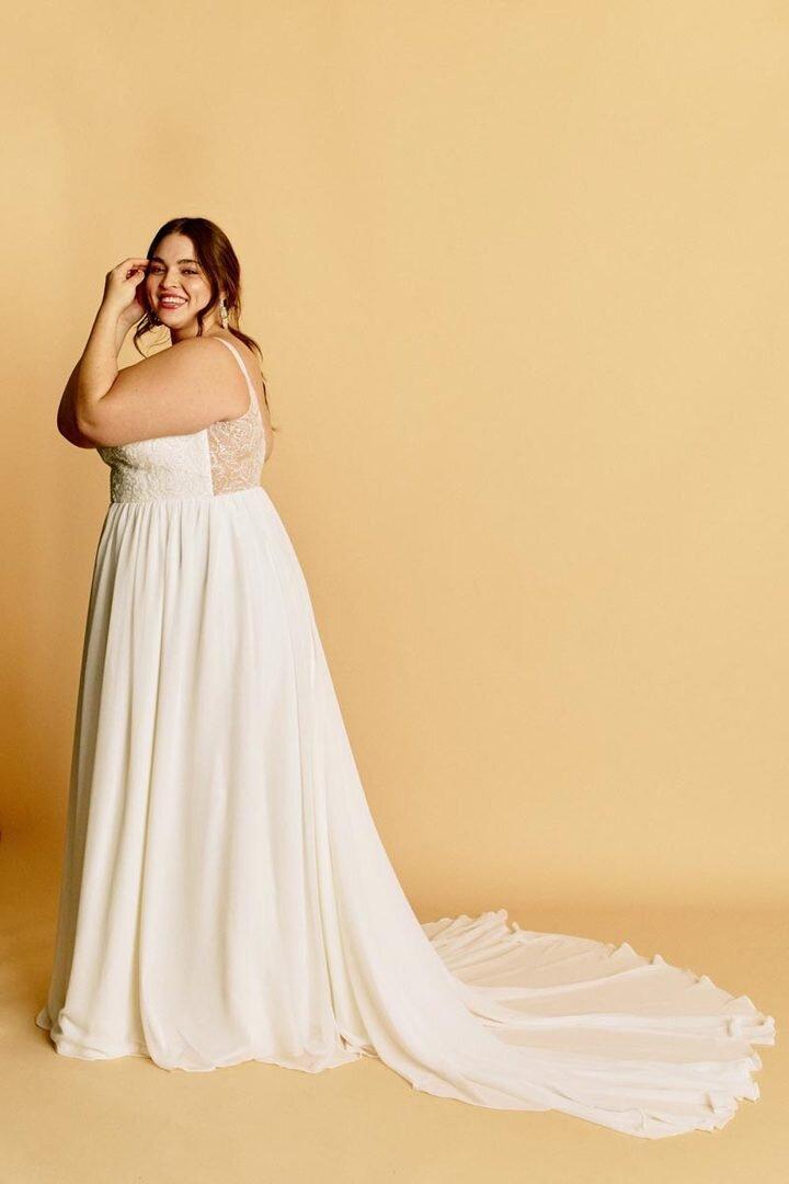 Plus size wedding dress with chiffon skirt and lace back