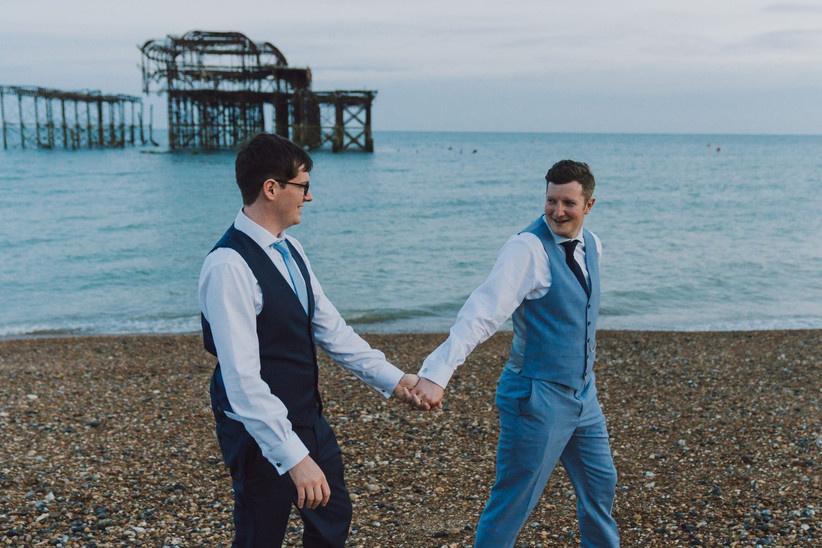same sex couple at beach wedding