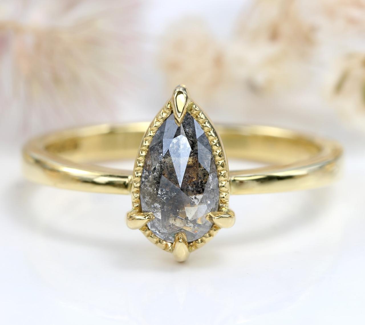 Pear salt and pepper diamond engagement ring
