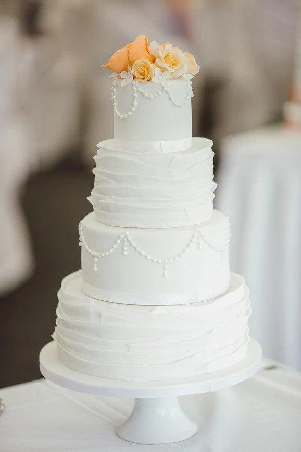 Buttercream Wedding Cake With Rose Gold Fondant Pearls