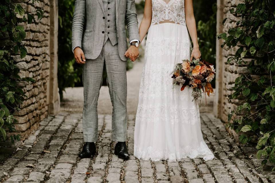 Bride and groom holding hands