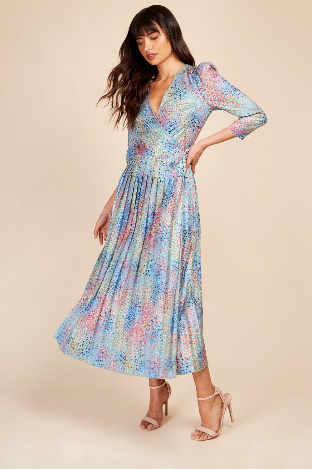 Model wearing a confetti print wrap satin wedding guest dress