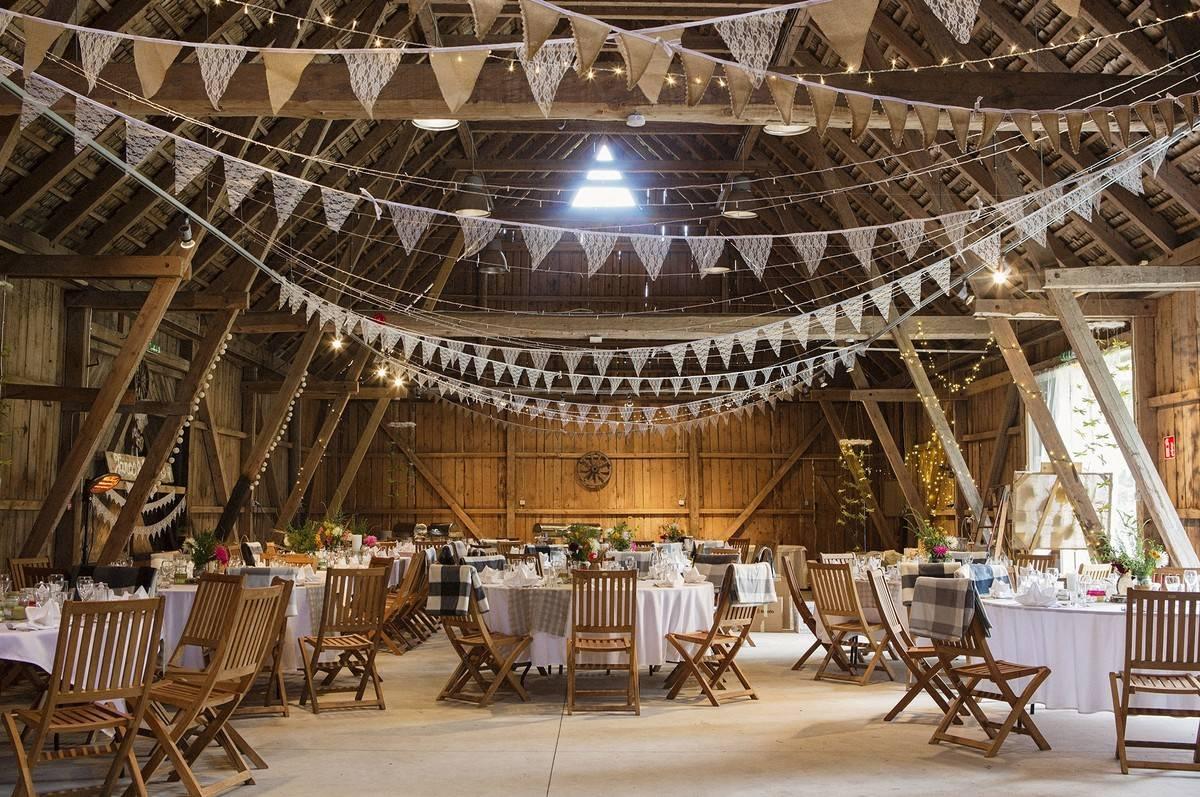Rustic barn dining area with bunting