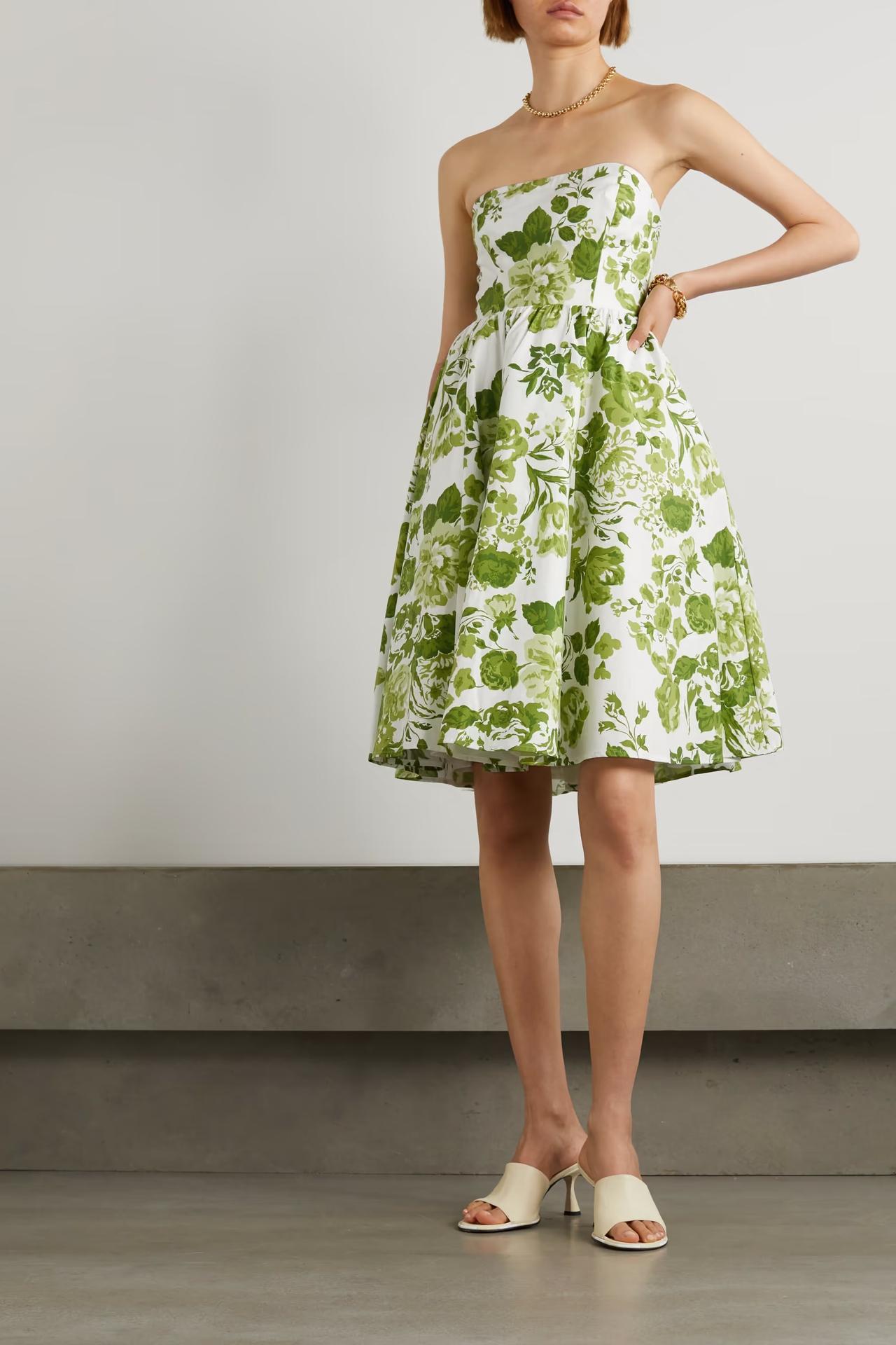 Model wearing a strapless green floral bridesmaid dress