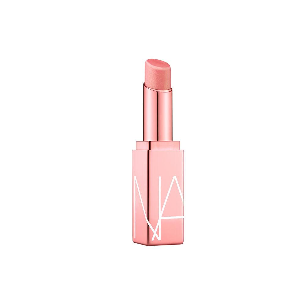 Pink metallic tube of pink lip balm