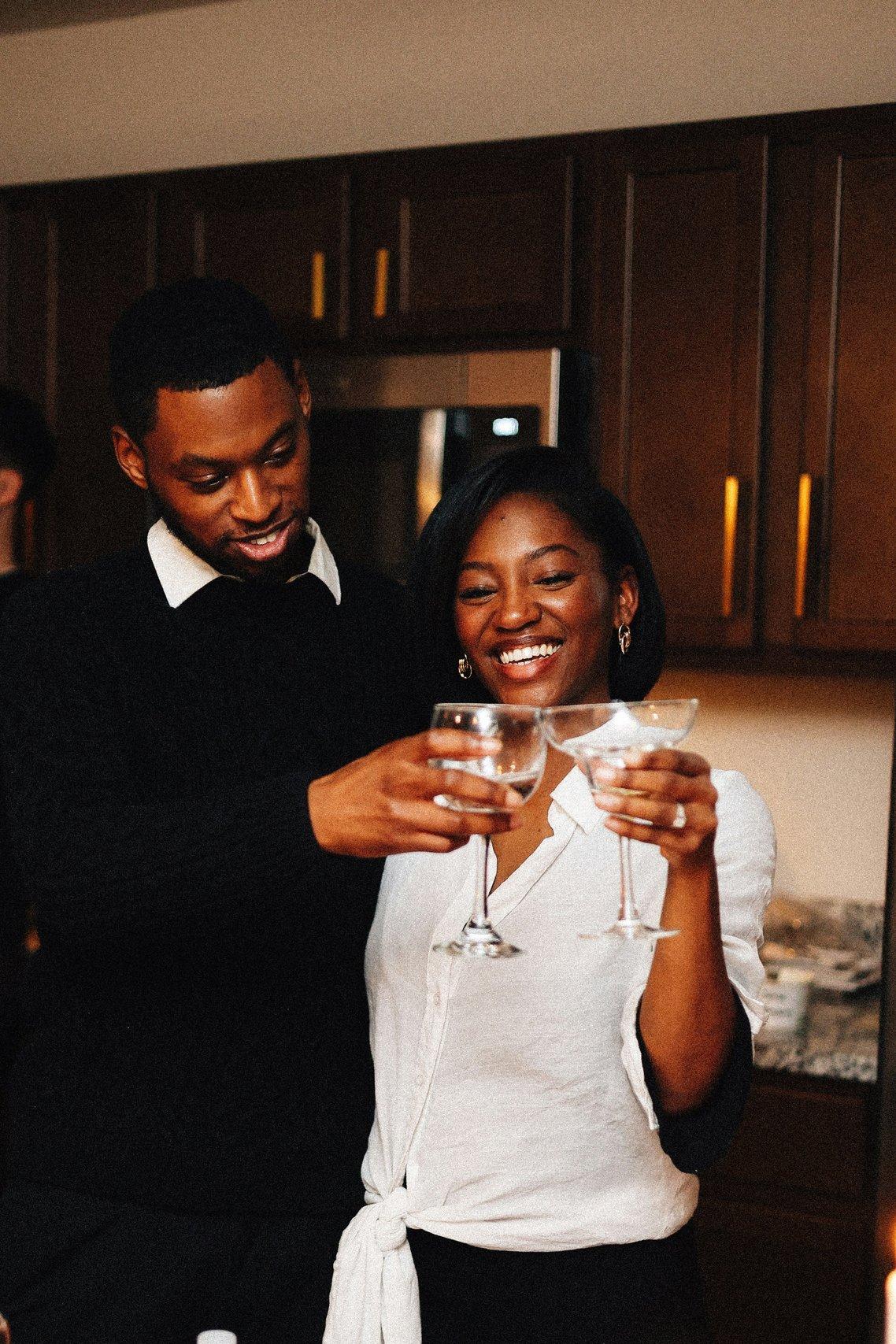 couple drinking cocktails at home