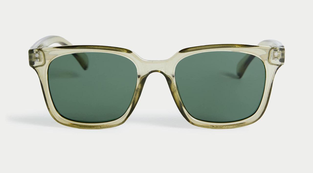 A pair of D frame sunglasses with olive coloured shades.