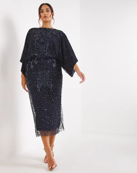 40 Chic Winter Wedding Guest Dresses for Every Budget - hitched.co.uk