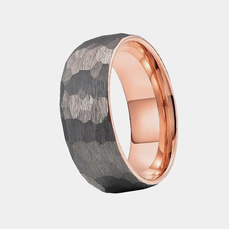 thick silver hammered band with a shiny rose gold inner band