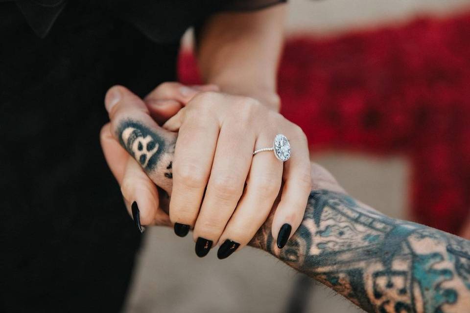 Celebrity Kourtney Kardashian's engagement ring - a oval cut diamond on a skinny band