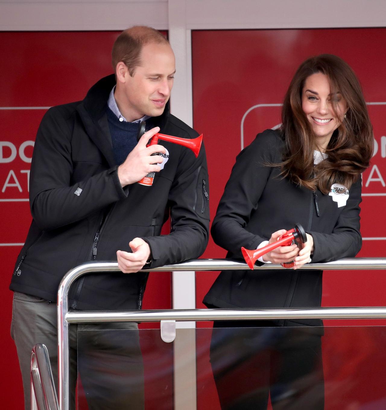 Kate Middleton and Prince William play around with a fog horn