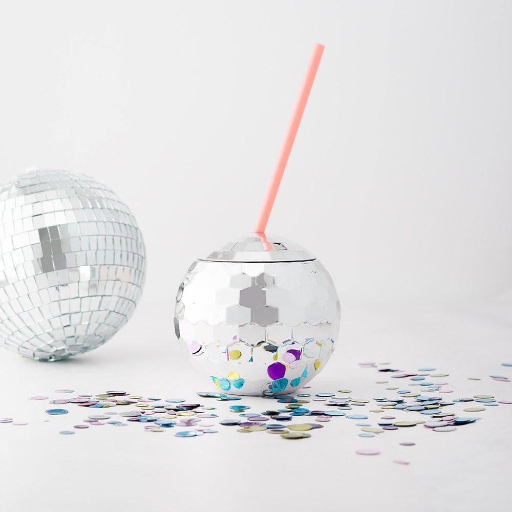 Disco ball tumbler with a pink straw