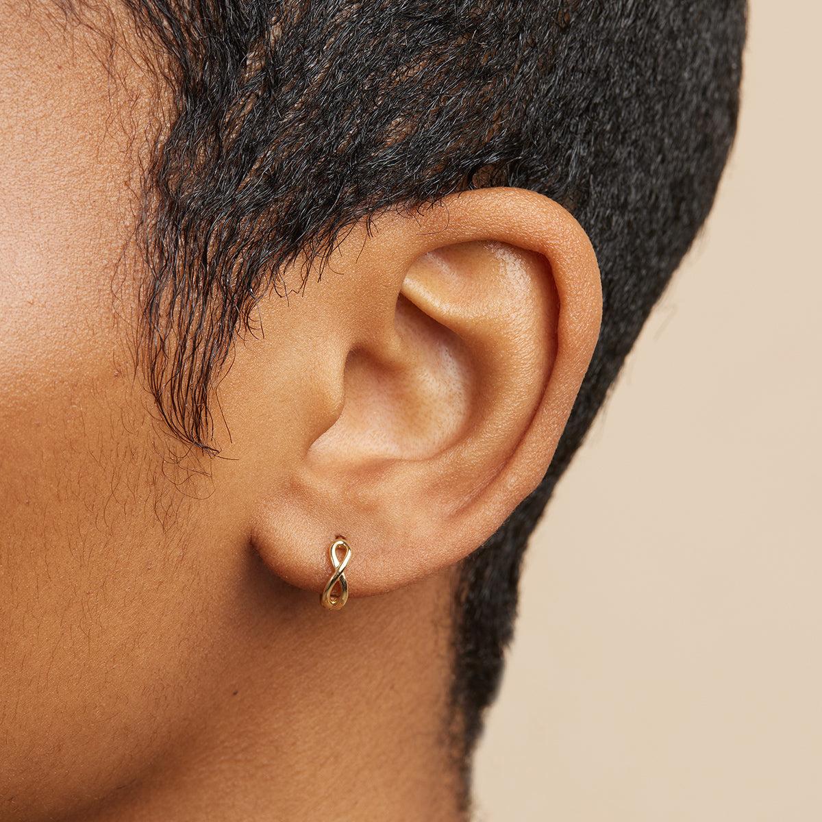Gold infinity huggies earrings