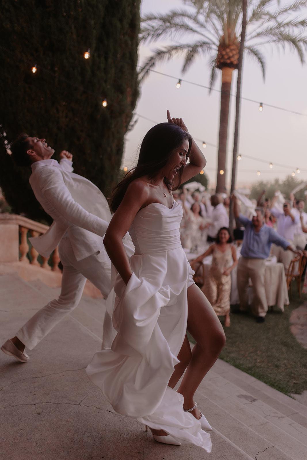 Josie and Cameron dancing into their wedding reception