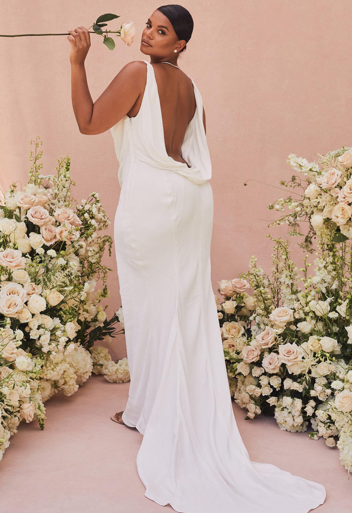 https://cdn0.hitched.co.uk/article/5604/original/1280/png/144065-cheap-wedding-dresses-in-the-uk-house-of-cb-backless.jpeg