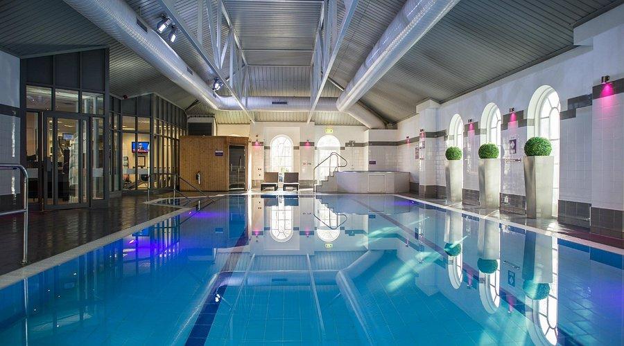 a large swimming pool in the gym of Exeter Southgate Hotel