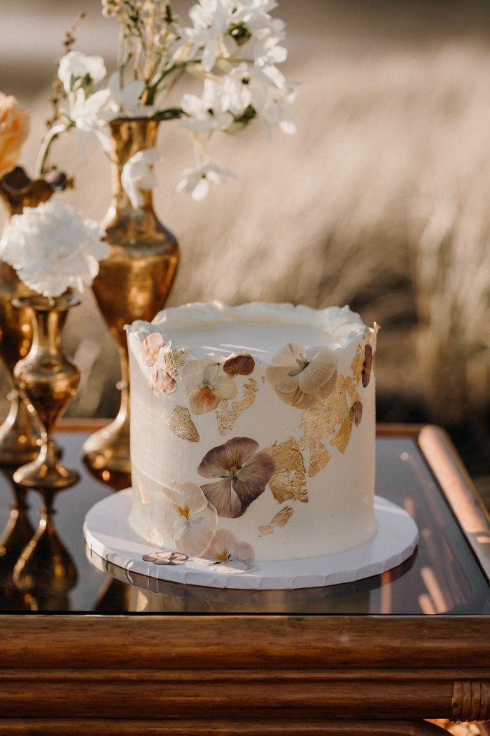 A big beautiful cake with small cakes stands on the festive table Stock  Photo | Adobe Stock