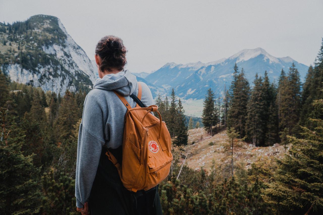 a woman on honeymoon in july in the mountains in austria