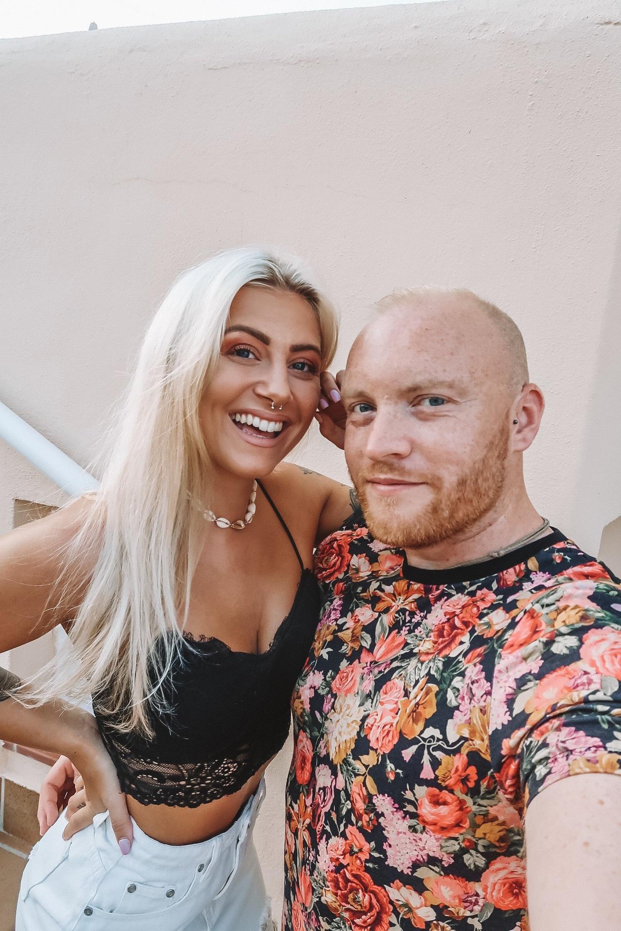 The writer and her fiance taking a selfie together