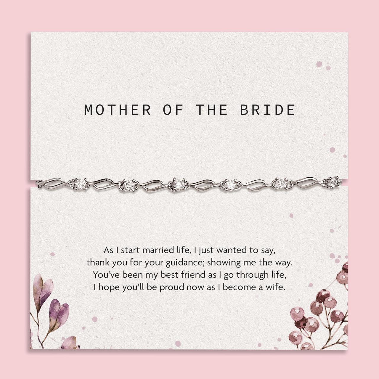 A silver-plated bracelet on a piece of card that features a poem about the mother of the bride.