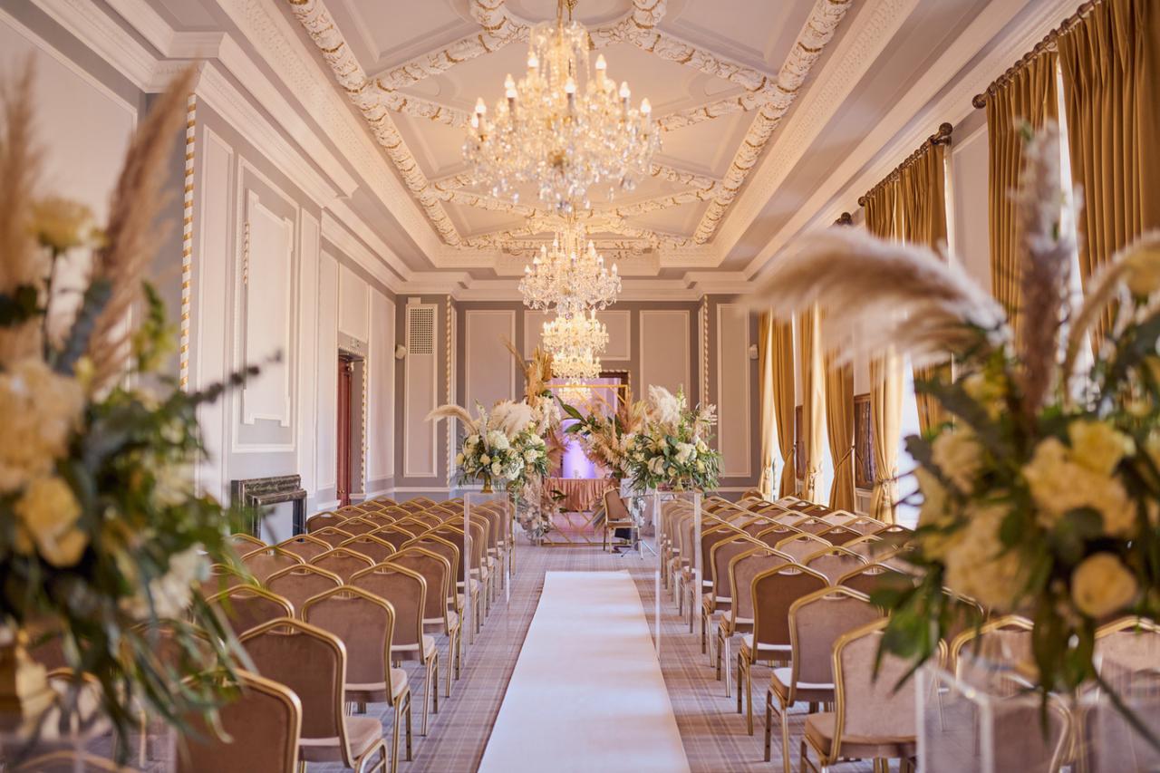 Interior of Manchester Hall wedding venue set up for a wedding ceremony.
