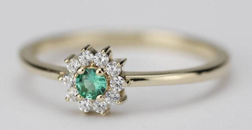 Emerald engagement ring with diamonds
