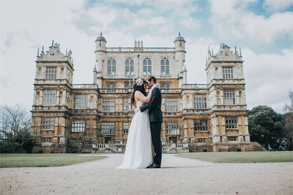 Bride and groom outside a stately home wedding venue