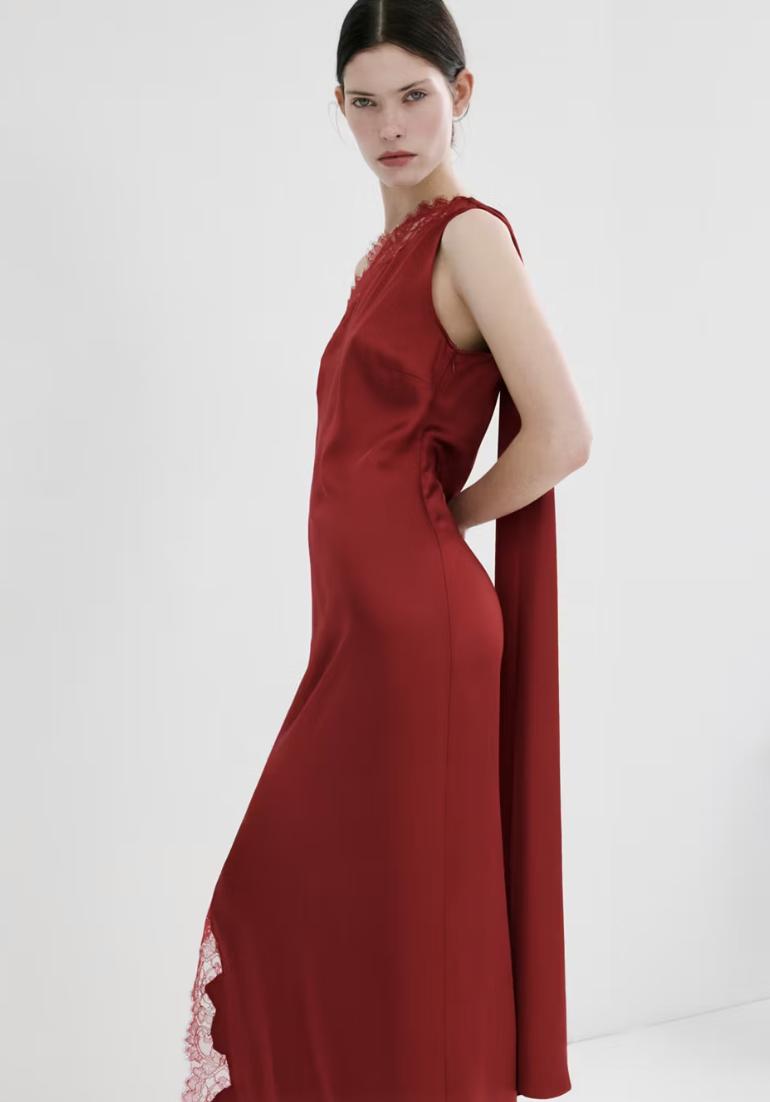 model wearing red lace embellished dress with scarf from Mango