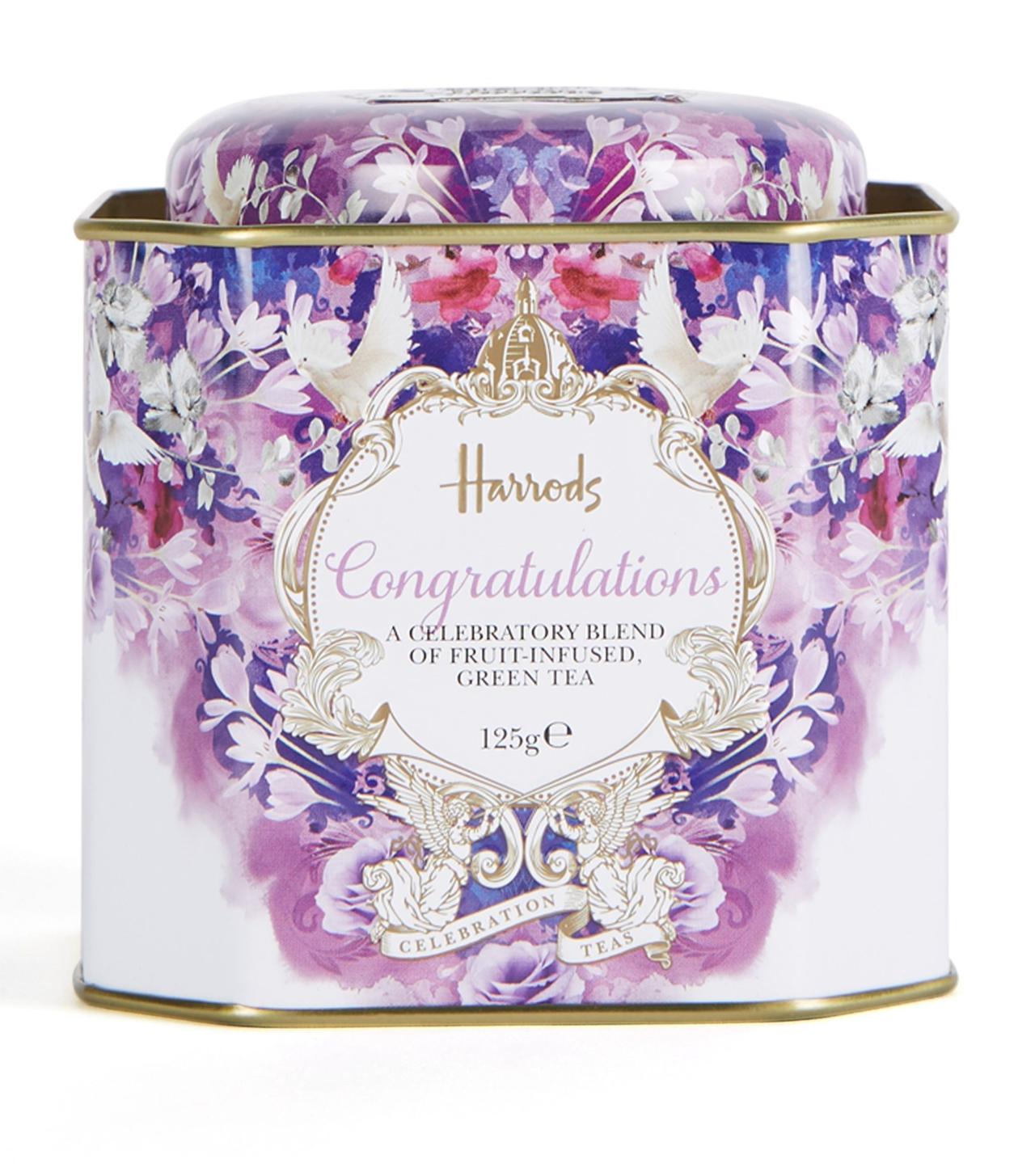 tin of loose leaf tea with congratulatory message on it