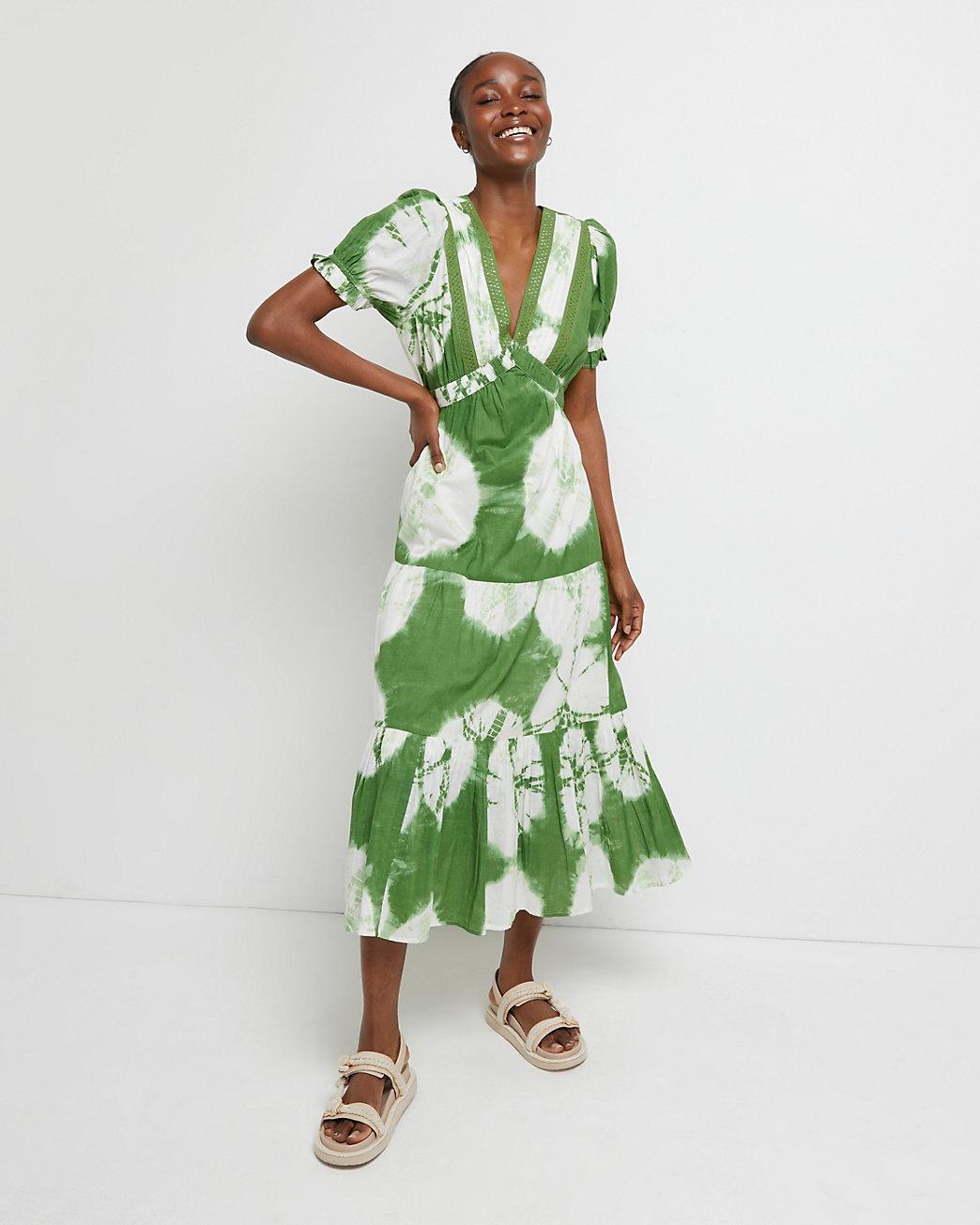 Model wearing green and white tie dye smock maxi dress with short sleeves
