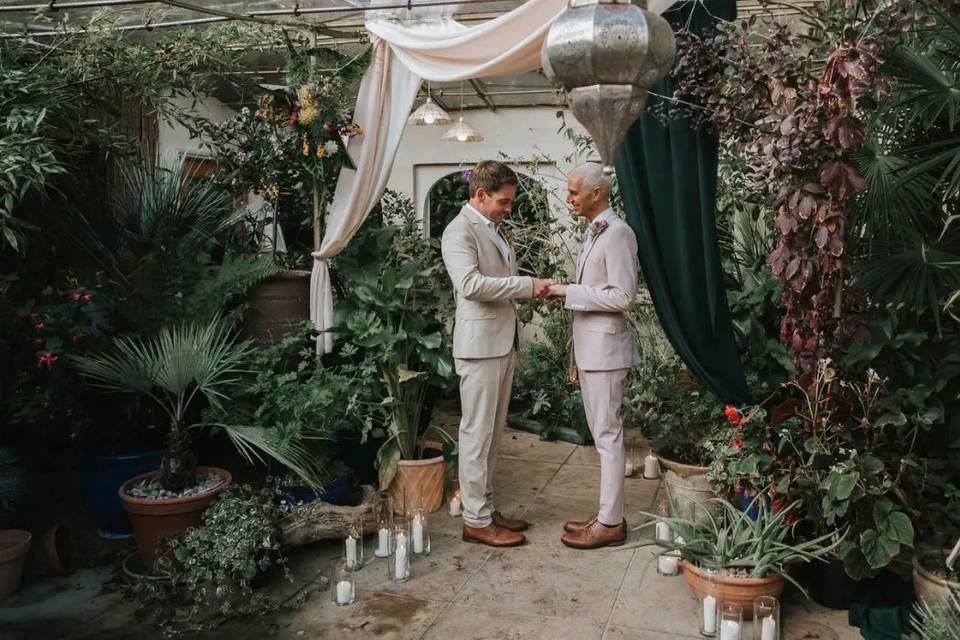 LGBTQ+ wedding couple celebrating a wedding in wedding season