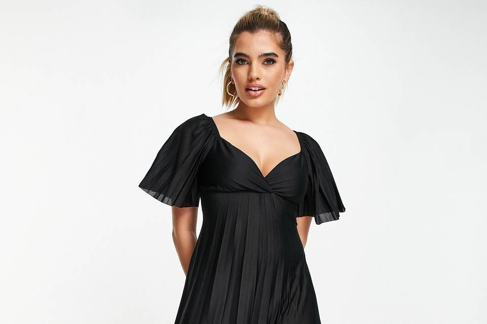Model wearing a black bridesmaid dress with angel sleeves