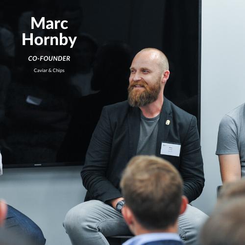 Marc Hornby giving a talk about his wedding business