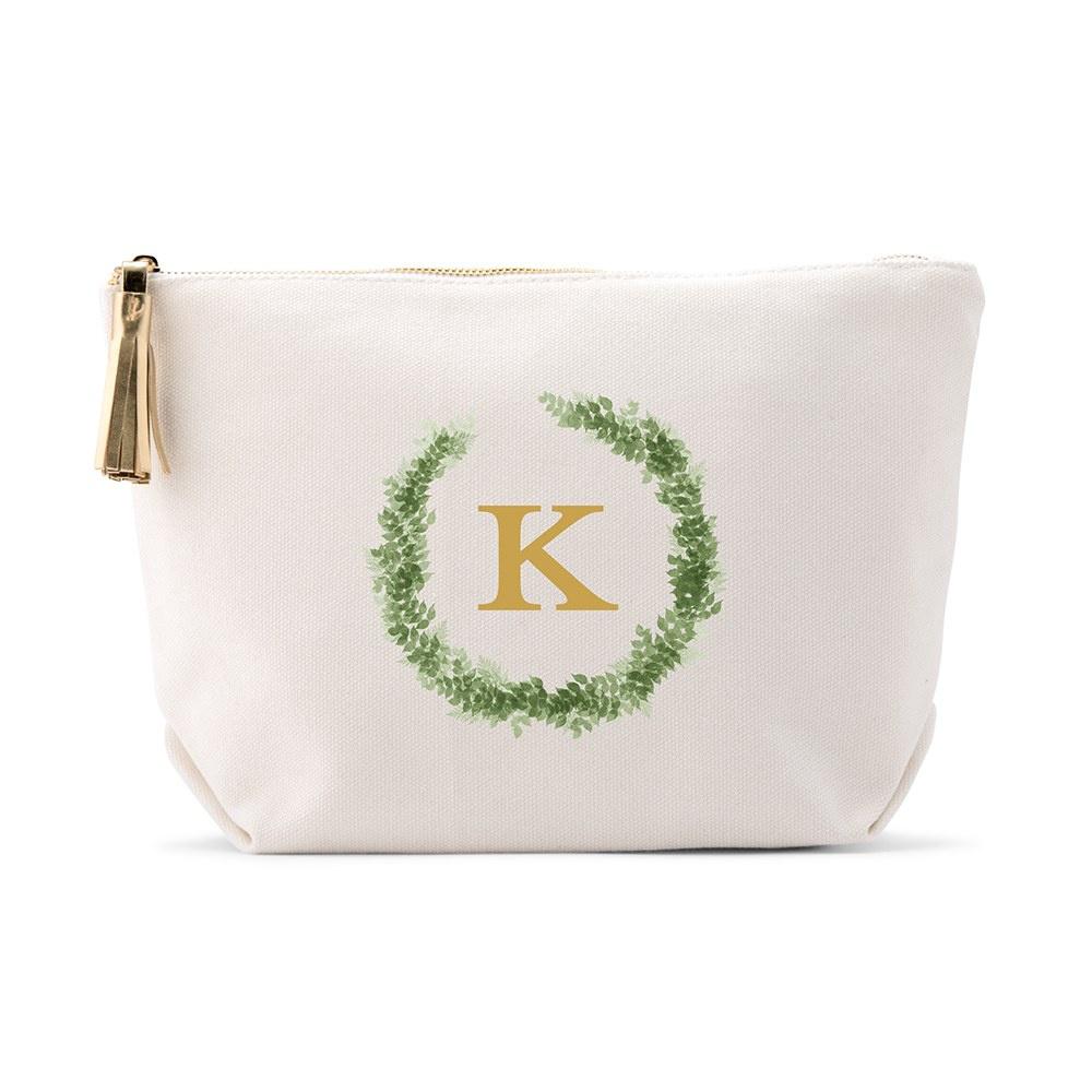 Canvas makeup bag with gold lettering and a wreath design