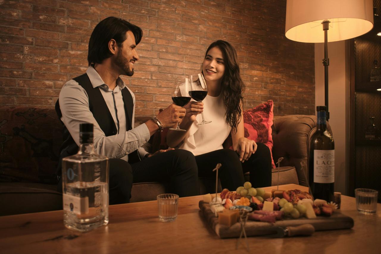 couple with cheese and wine