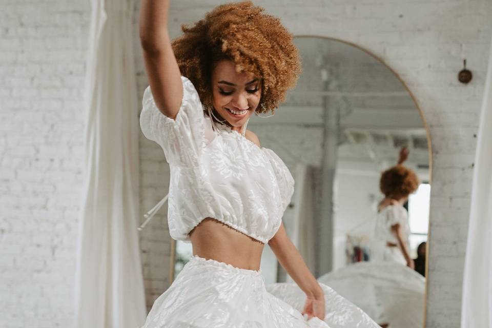 Model wearing a lace cut out alternative wedding dress