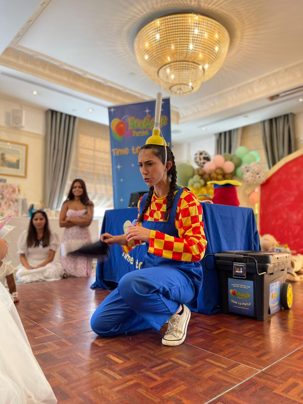 A children's wedding entertainer entertaining children at a wedding