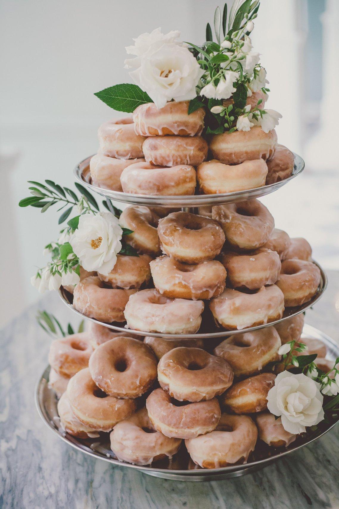 Doughnut rustic wedding cake with white flowers