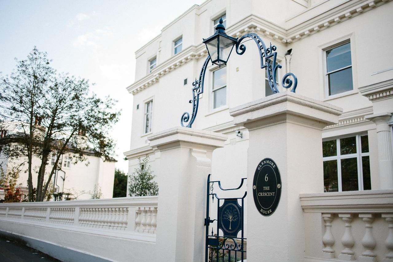 An exterior of a georgian stately home wedding venue with a white facade