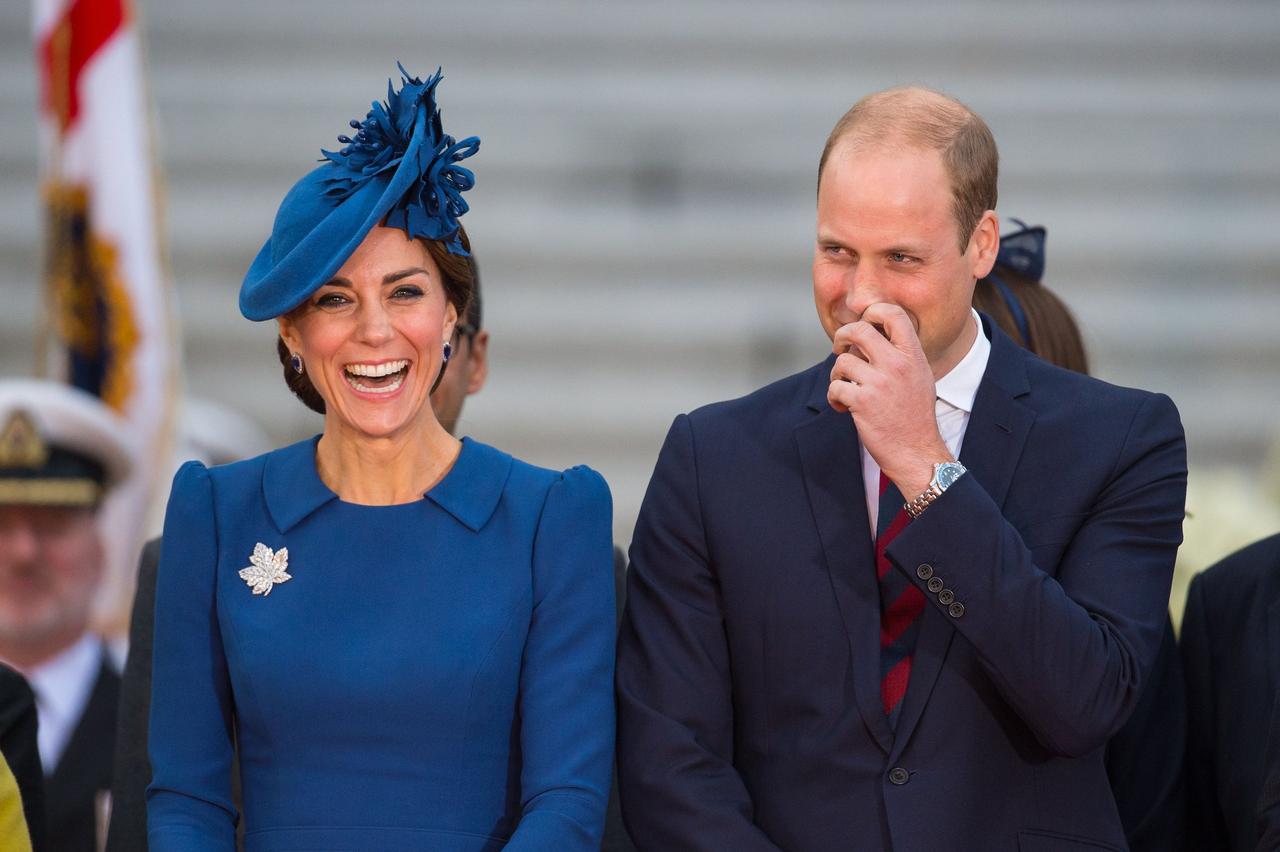 Kate Middleton and Prince William laugh together