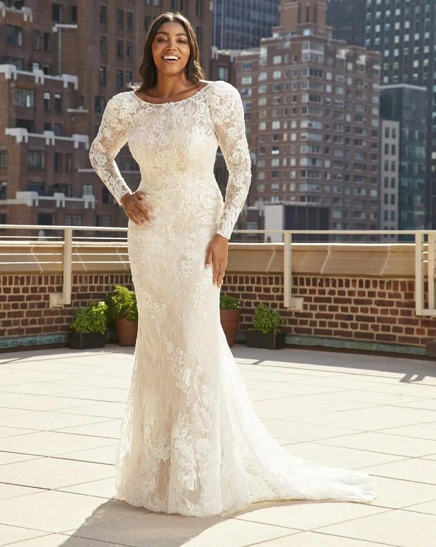 Sexy Long-Sleeve Lace Wedding Dress with Cutouts and Full Train