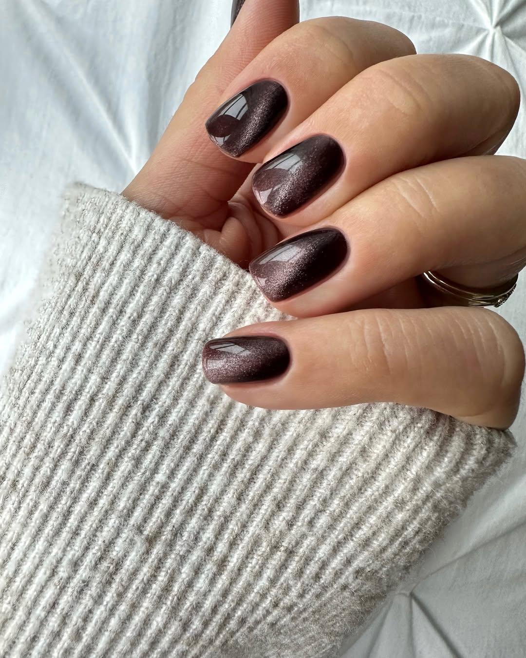 black cat eye manicure