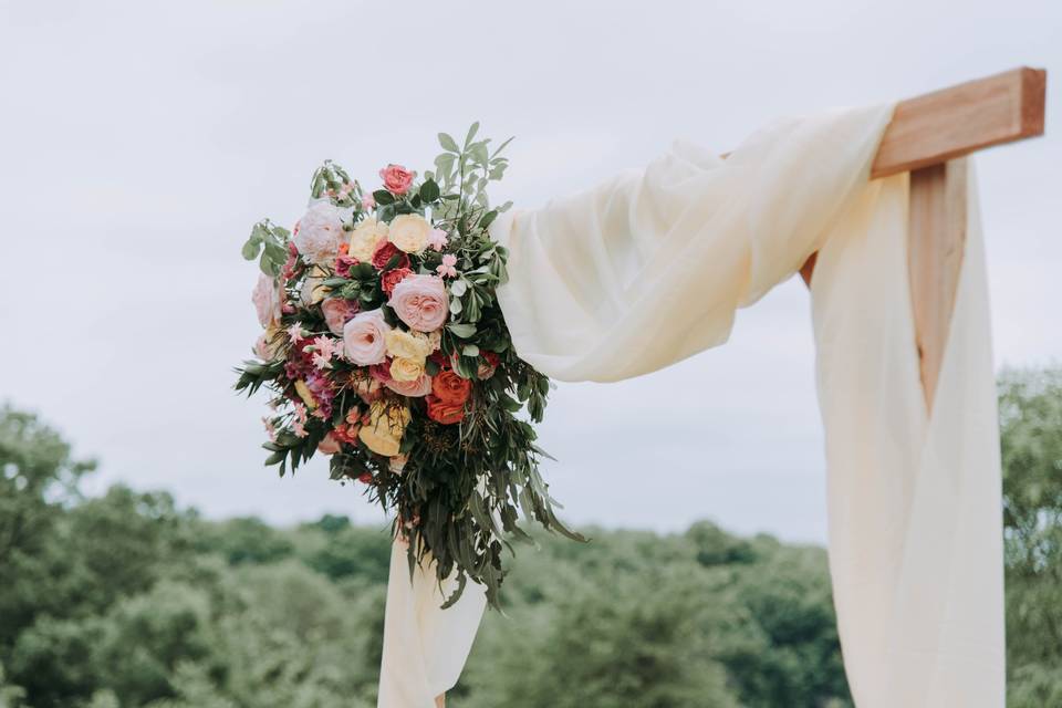 Rustic wedding flower arch