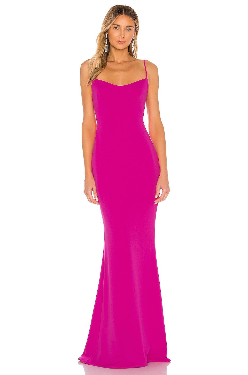 Model wearing a hot pink evening gown