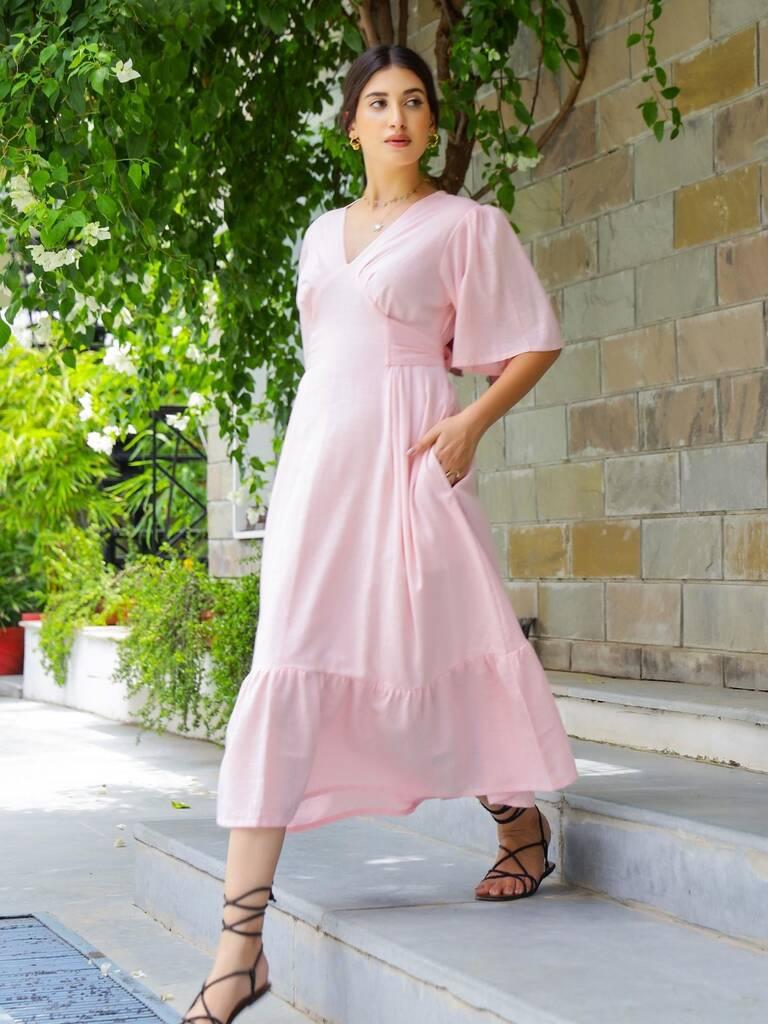 model wearing a pink tea dress from not on the high street