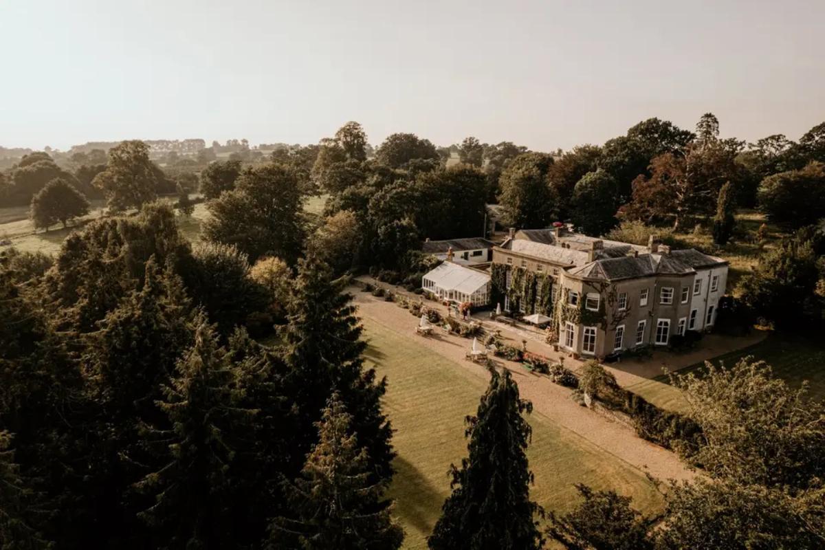 4 an aerial view of pennard house in somerset showcasing the grand house building and surrounding countryside and trees