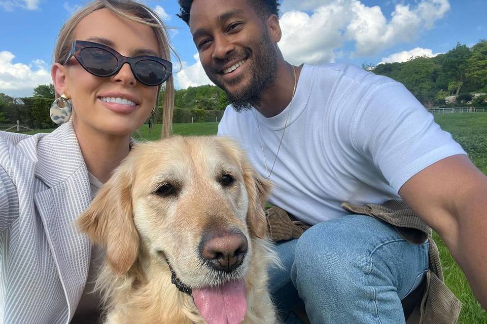Faye Winter and Teddy Soares from Love Island pose with their dog
