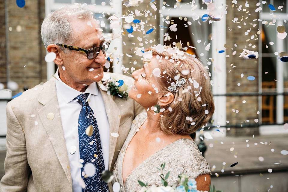 Bride and groom with confetti 