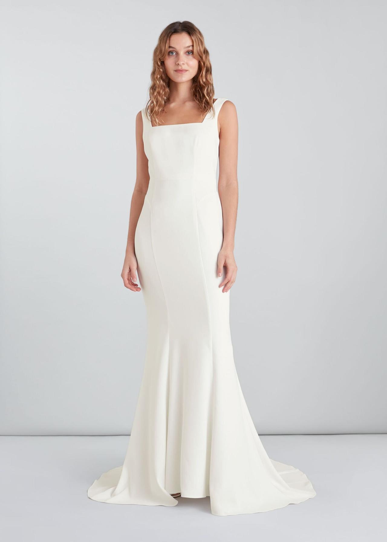 Model in a sleek white wedding dress